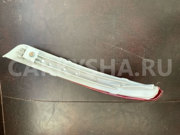 Отражатель в бампер задн прав Almera G15 11-18г. Nissan Almera оригинальный номер L120010701R